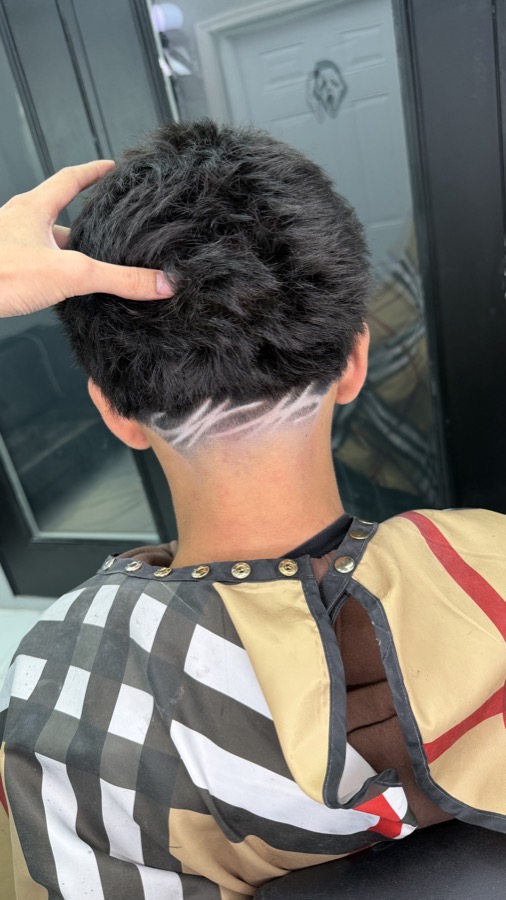 Haircut with design by Julian_thebarberr